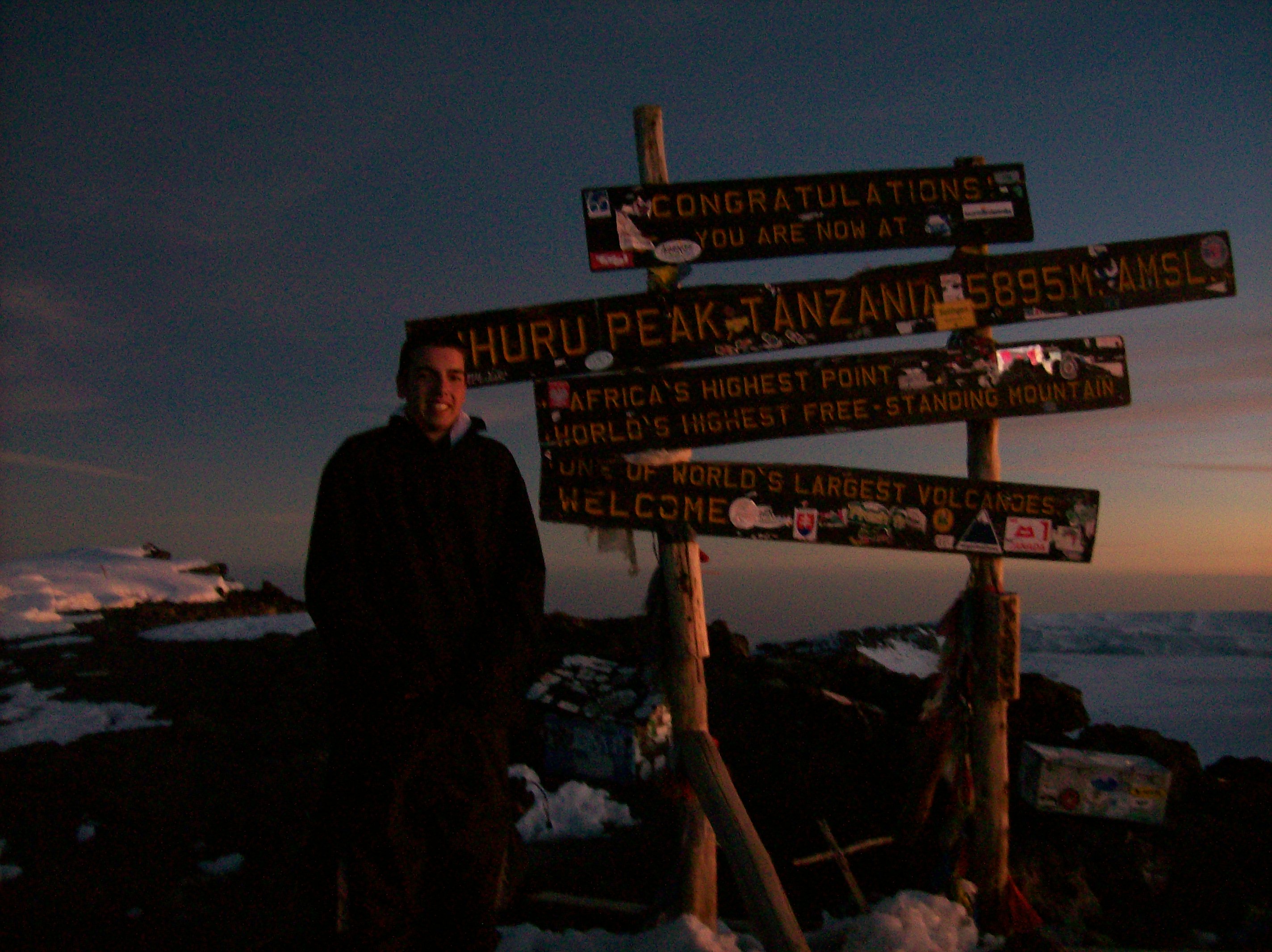 Andrew Riley summit of Kilimanjaro